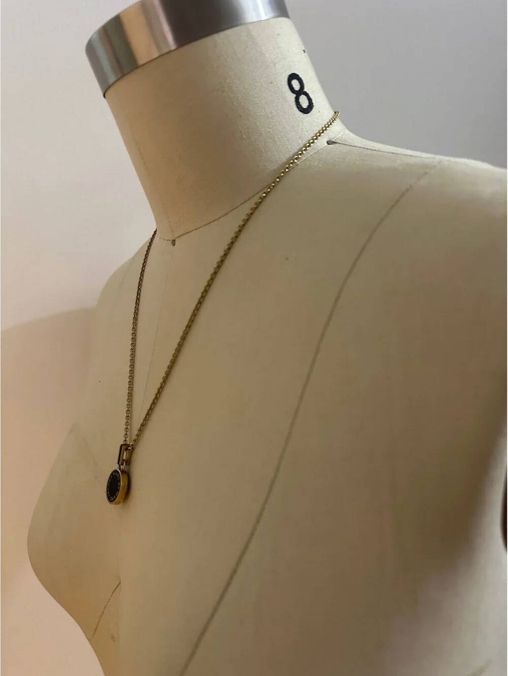 MARC BY MARC JACOBS Gold and Black Round Pendant Locket